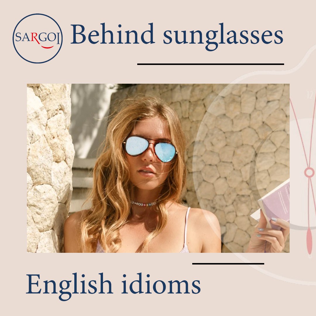 to describe someone who appears aloof, mysterious, or unapproachable due to wearing sunglasses