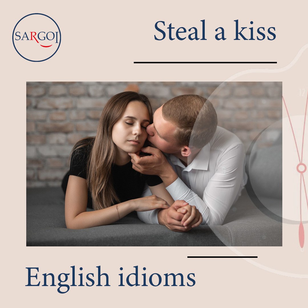 to take a quick and unexpected kiss from someone, often in a playful or romantic manner.  